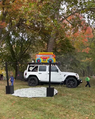 BoomBoxCar centered at a daytime outdoor event